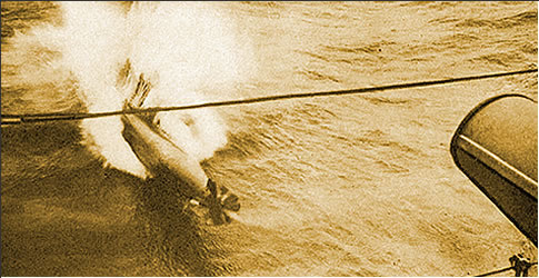 Photograph of torpedo being launched from a German destroyer.